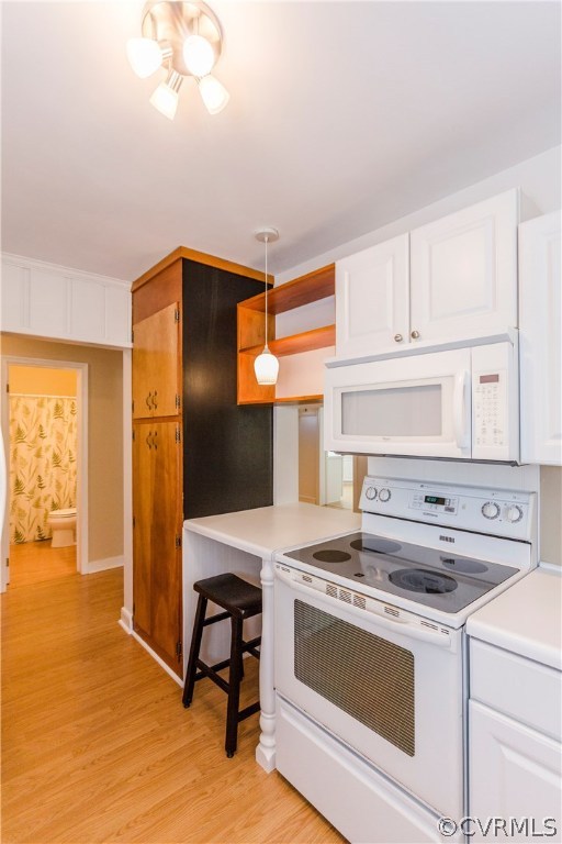 3843 Treely Road Chester, VA 23831 - Photo 28 of 50 a kitchen with granite countertop cabinets stainless steel appliances and a dining table