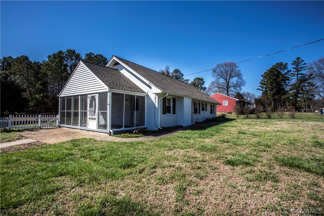 3843 Treely Road Chester, VA 23831 - Photo 3 of 50 a front view of a house with a garden and yard