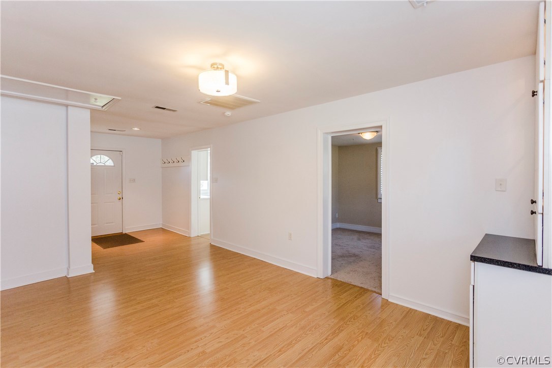 3843 Treely Road Chester, VA 23831 - Photo 34 of 50 a view of empty room with wooden floor and fan