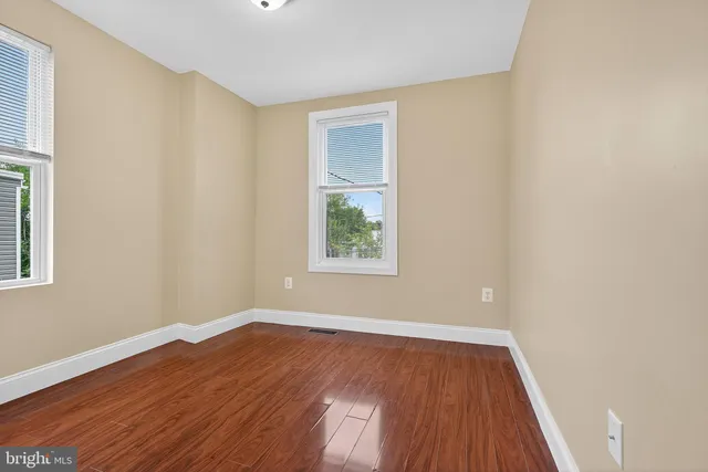 a view of livingroom with hardwood floor and hallway