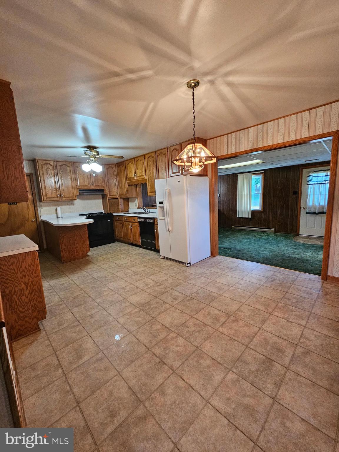 1124 Cedarbrook Road Hampstead, MD 21074 - Photo 15 of 46 Country Kitchen with Light over Dining Area