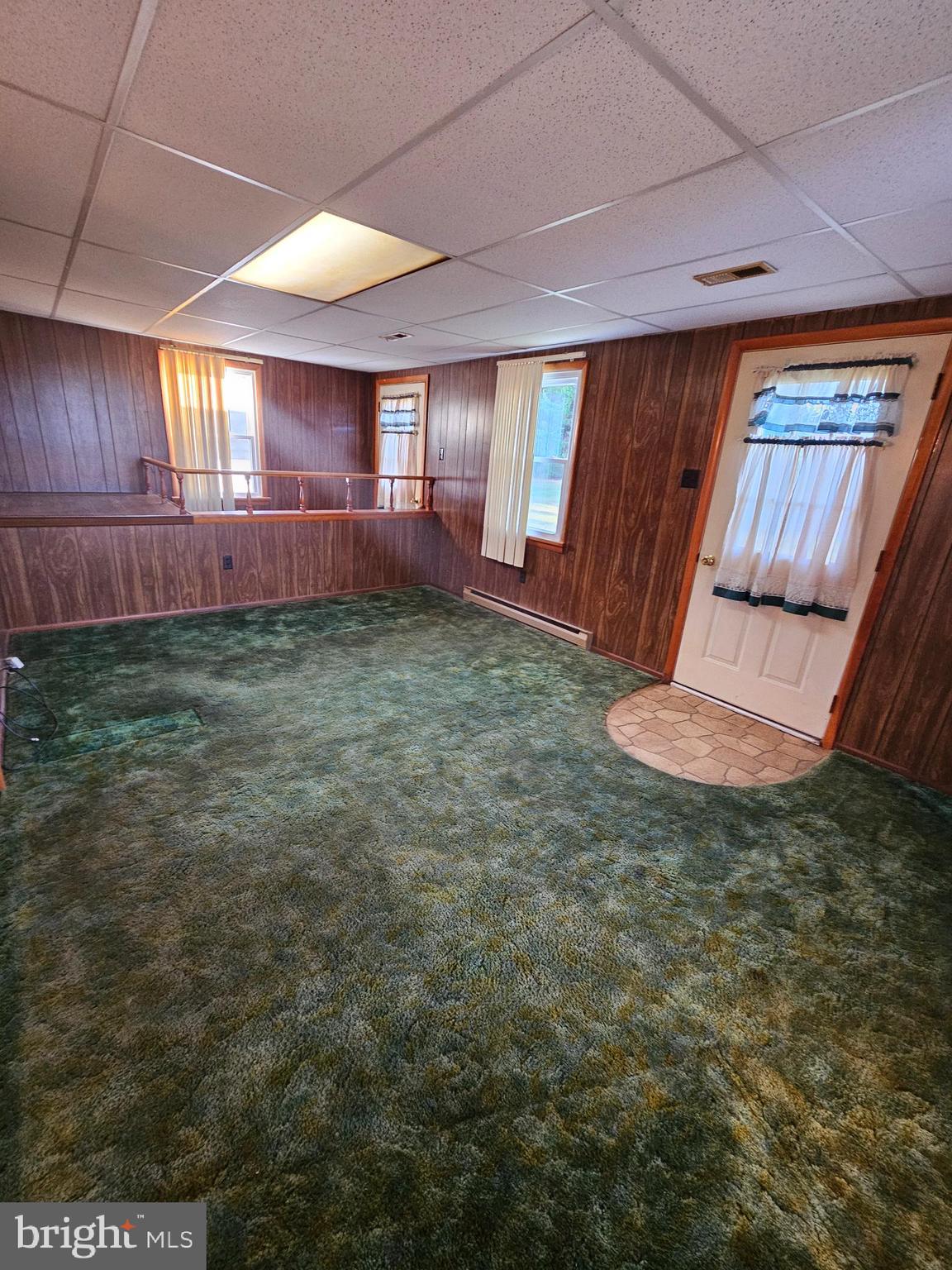 1124 Cedarbrook Road Hampstead, MD 21074 - Photo 19 of 46 Vinyl by Door to Rear Yard protects carpet