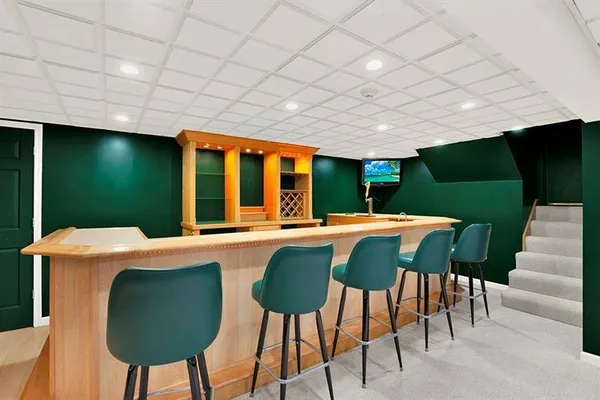 a view of an chairs and tables in the patio