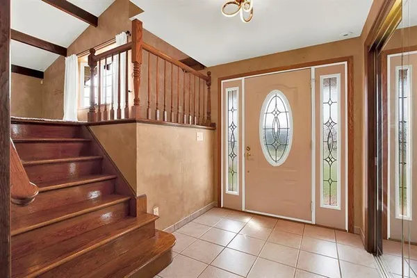 a view of an entryway with sitting area