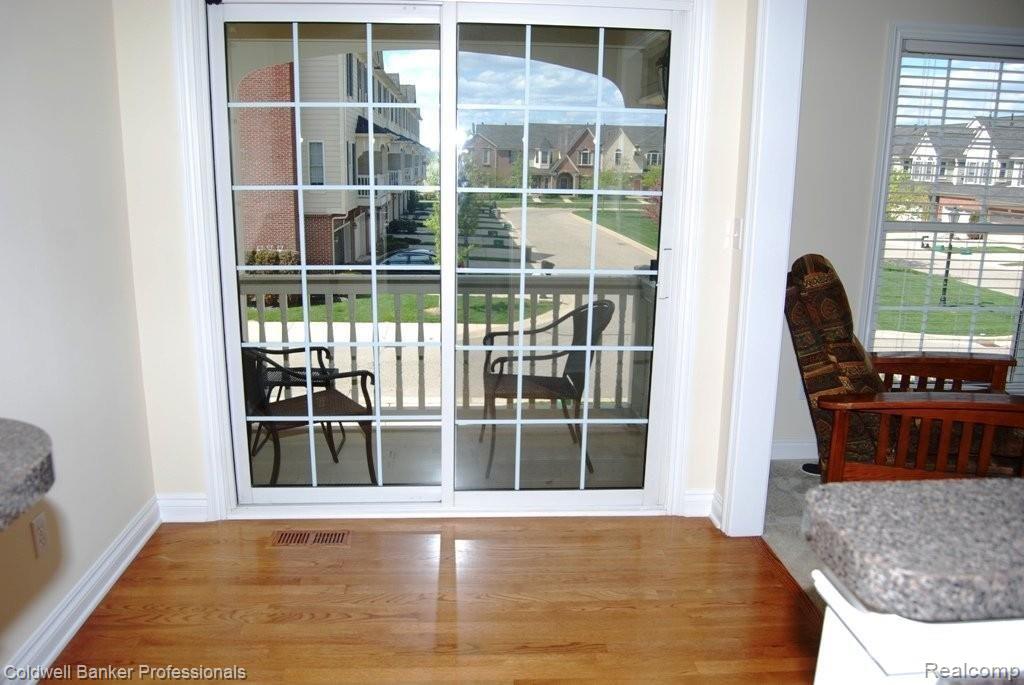 45657 North Stonewood Road Canton, MI 48187 - Photo 9 of 23 Breakfast nook open to balcony