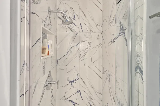 a bathroom with a shower curtain