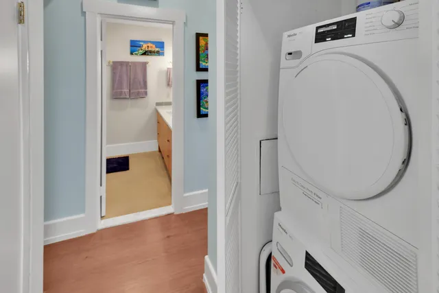 a view of hallway with washer and dryer