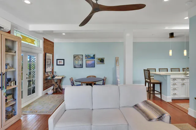a living room with furniture and a table