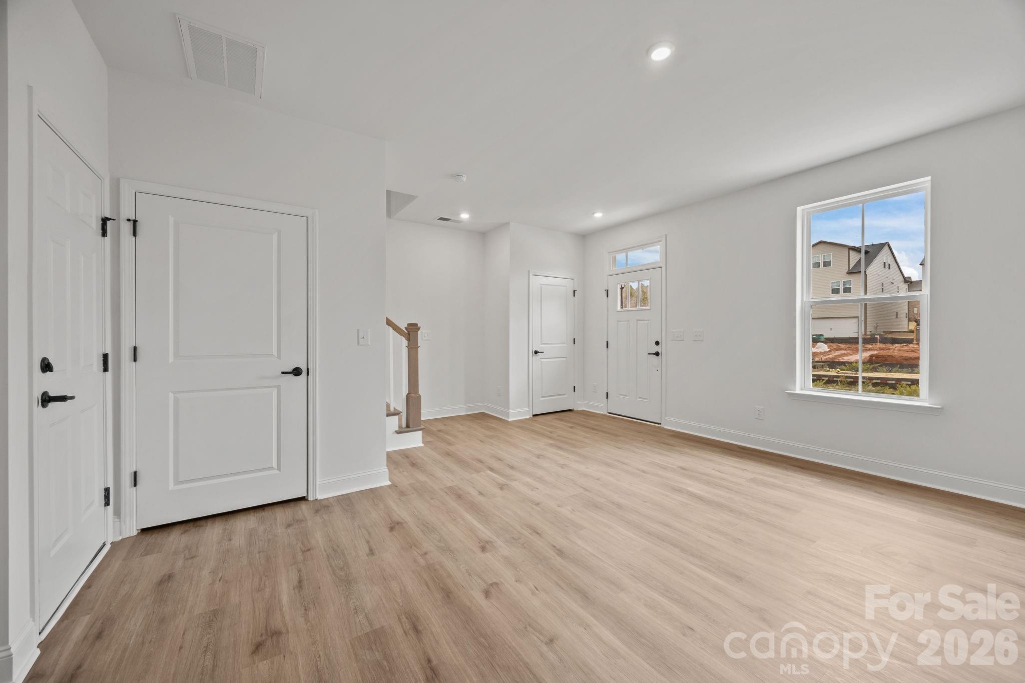 3025 Rozzelles Ferry Road Charlotte, NC 28208 - Photo 4 of 23 a view of an empty room with a window