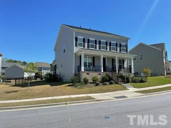 a view of a building with a street
