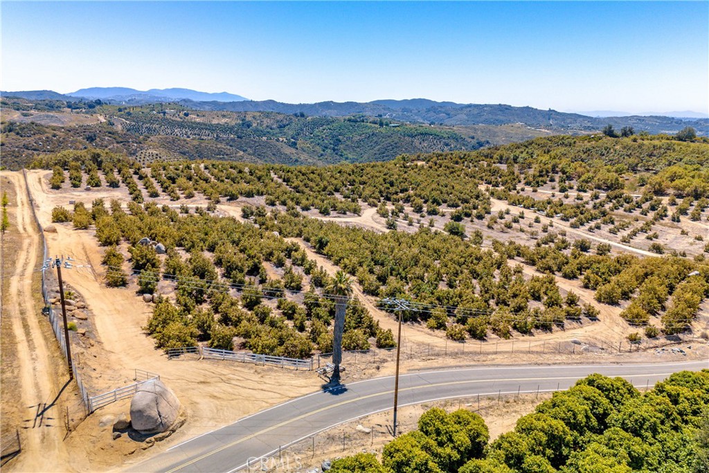 2526 Camaron Road Temecula, CA 92590 - Photo 2 of 34 Aerial of fully planted gently land on this 18+acre grove. There are 2 separate parcels.
