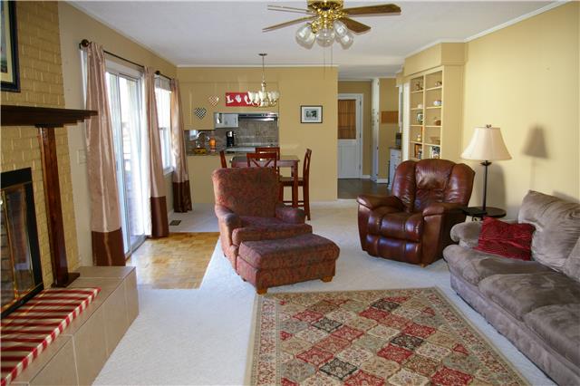 Den has eat-in area and looks through to the kitchen