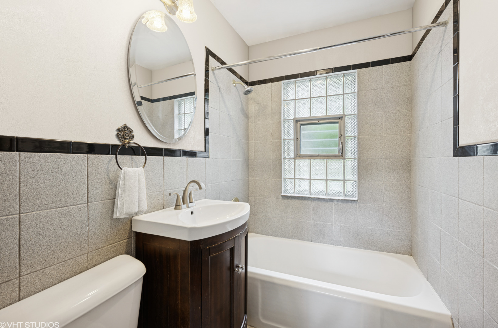 1800 Shermer Road Northbrook, IL 60062 - Photo 12 of 21 a bathroom with a sink and a mirror