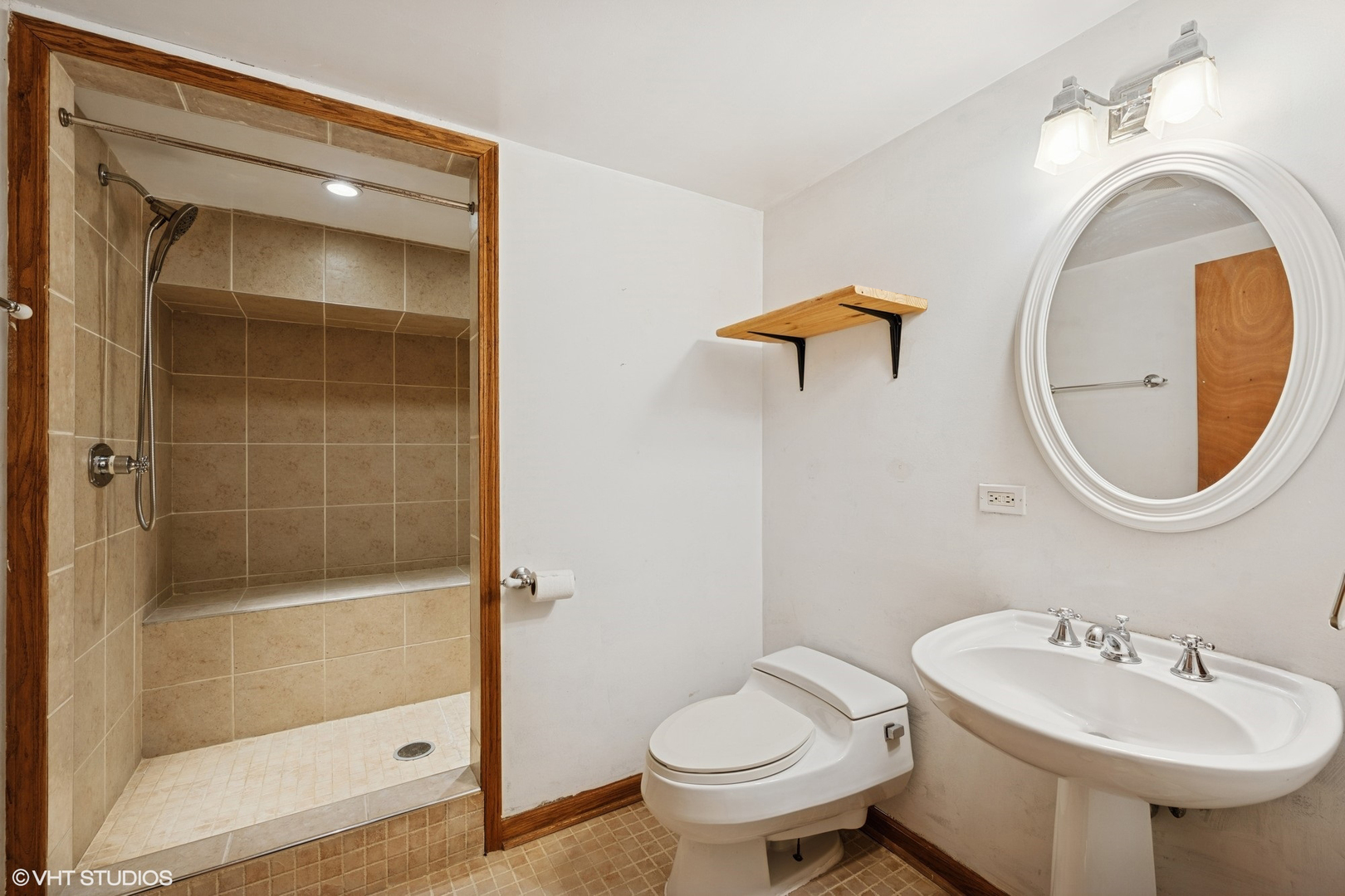 1800 Shermer Road Northbrook, IL 60062 - Photo 13 of 21 a bathroom with a sink toilet and shower