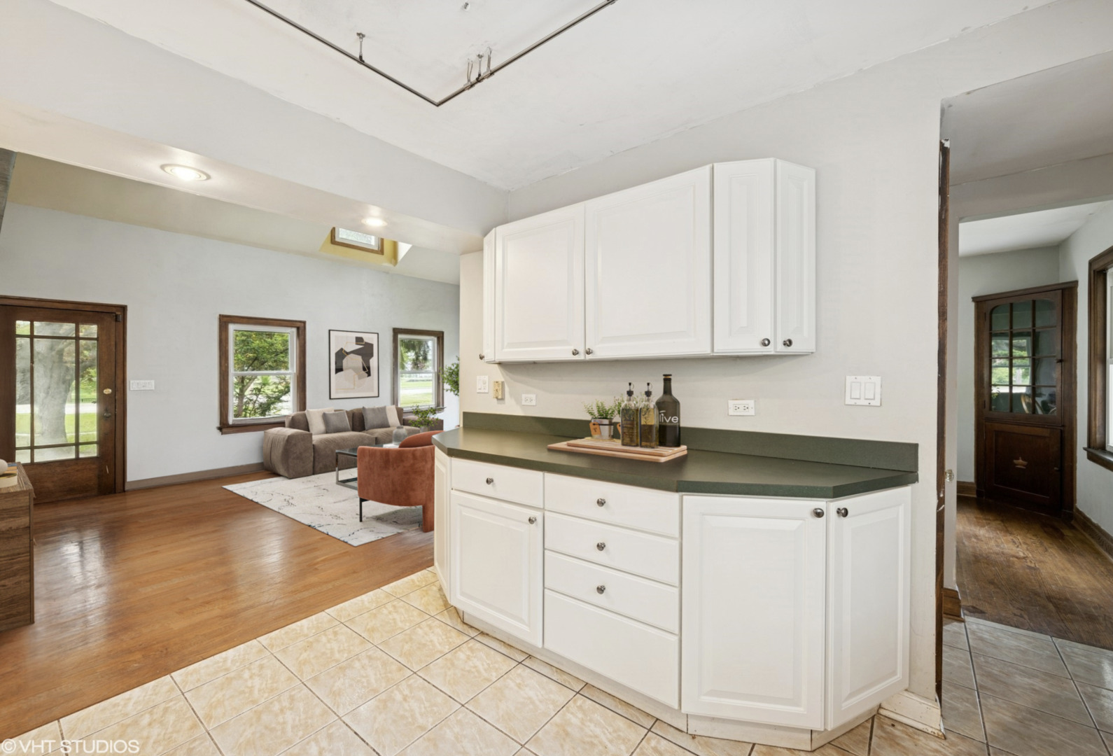 1800 Shermer Road Northbrook, IL 60062 - Photo 4 of 21 a kitchen with granite countertop a sink window and cabinets
