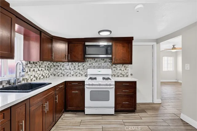 a bedroom with bed and a window