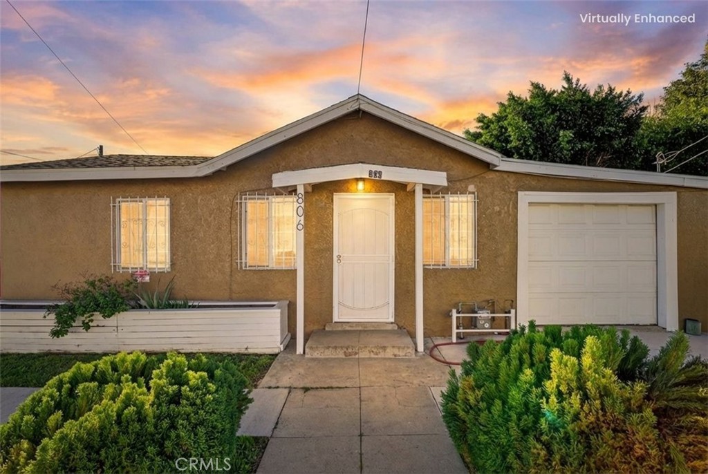 806 West Spruce Street Compton, CA 90220 - Photo 41 of 41 a front view of a house with garden