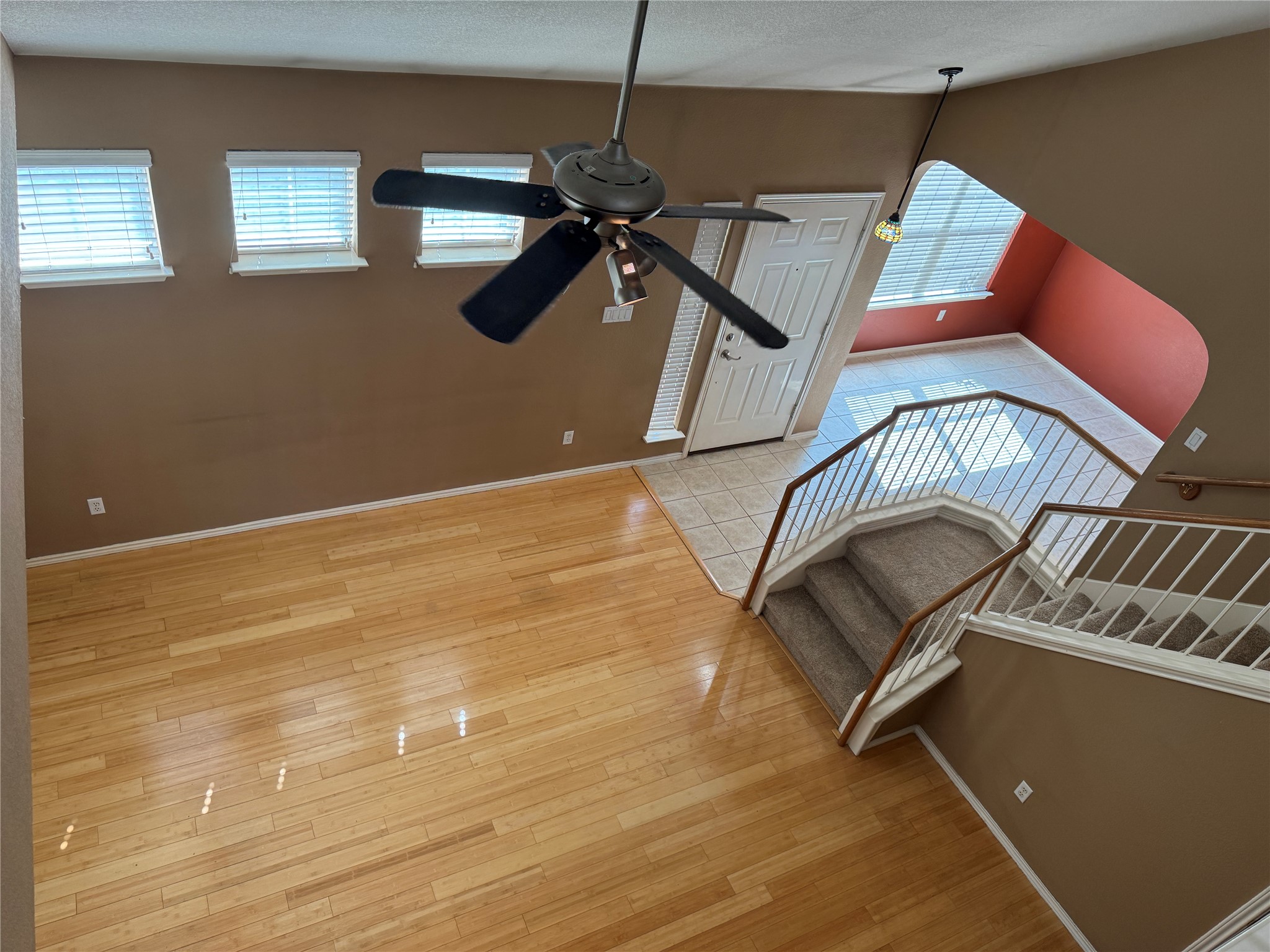 1900 Scofield Ridge Parkway, Unit 3503 Austin, TX 78727 - Photo 6 of 16 a room with wooden floor and windows