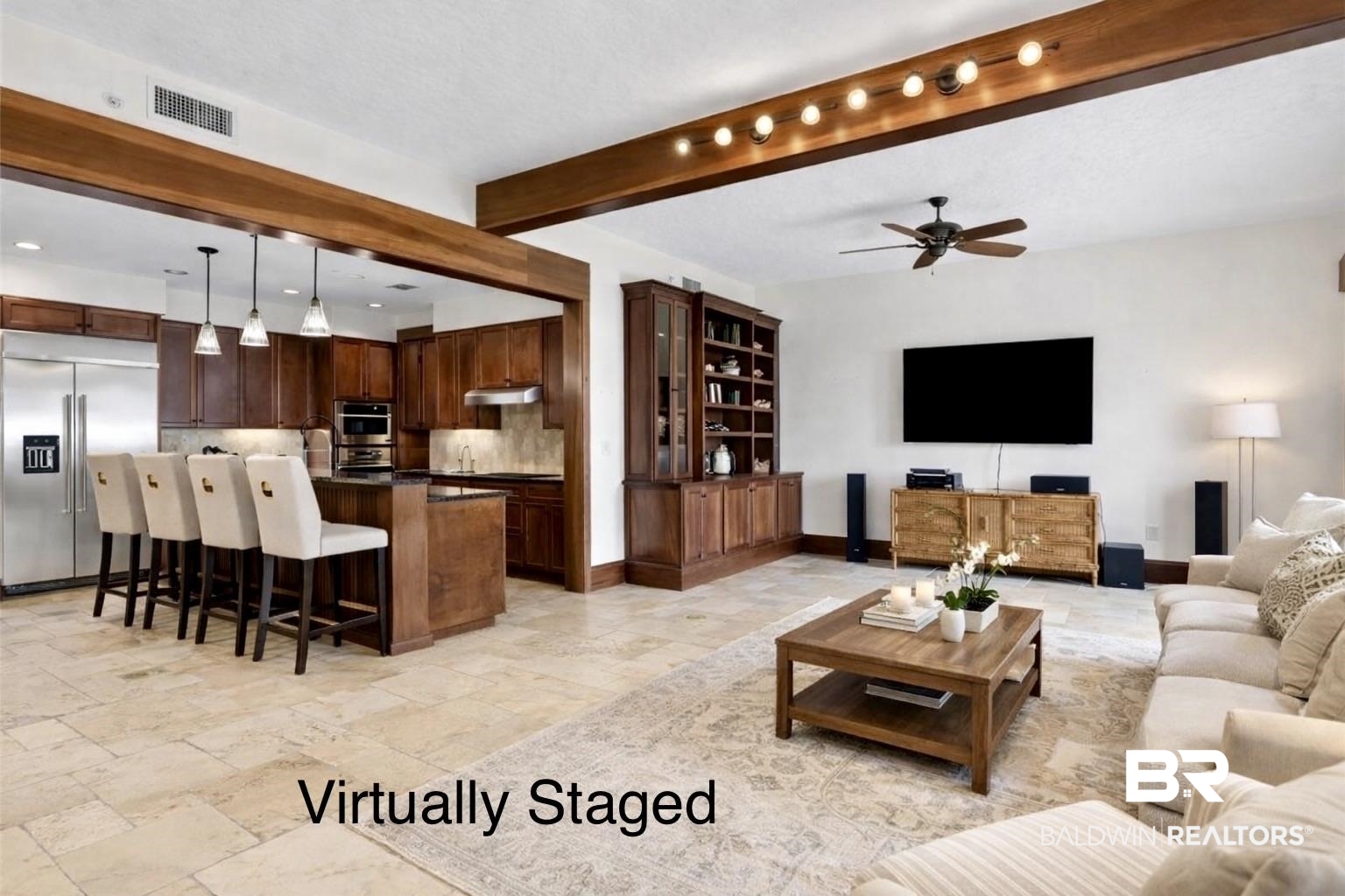 18269 Colony Drive, Unit 502 Fairhope, AL 36532 - Photo 4 of 28 Virtually staged living room with beam ceiling, a ceiling fan, and stone tile floors