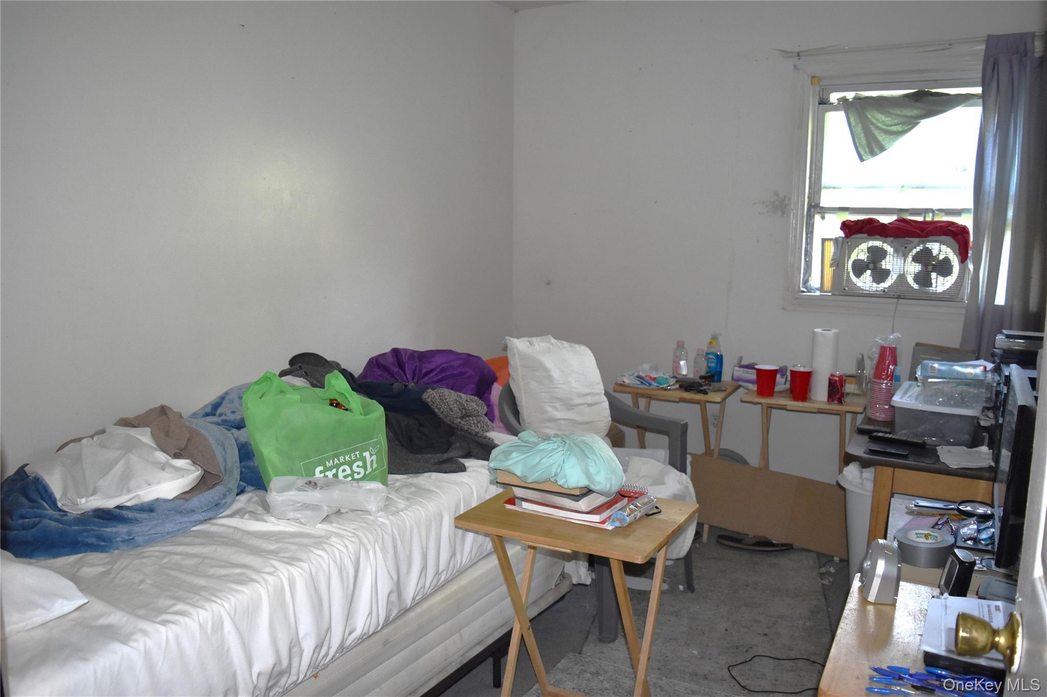 164 Brookside Farms Road Newburgh, NY 12550 - Photo 14 of 18 a bedroom with a bed and furniture