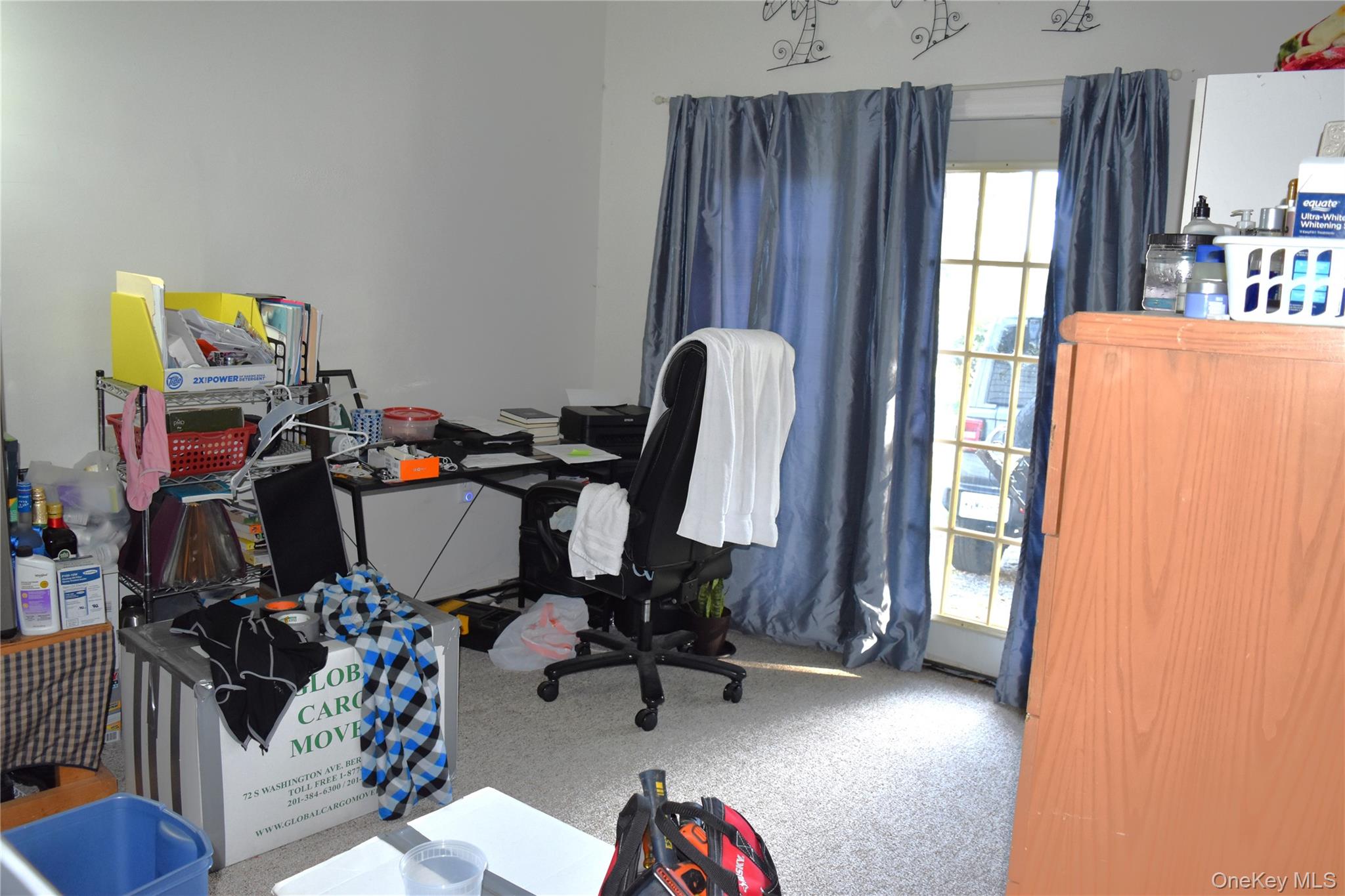 164 Brookside Farms Road Newburgh, NY 12550 - Photo 16 of 18 a view of a workspace with furniture and a window