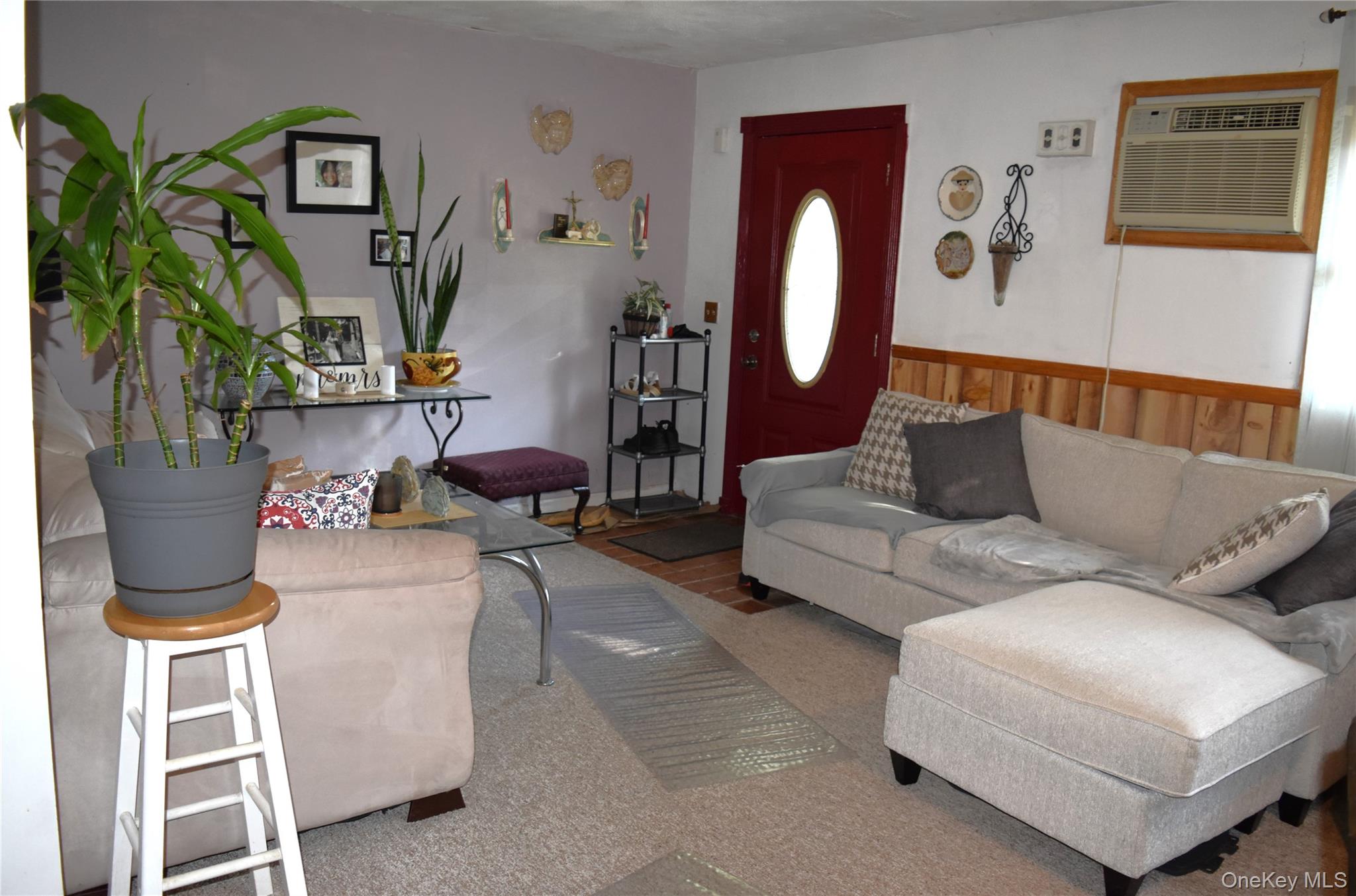 164 Brookside Farms Road Newburgh, NY 12550 - Photo 5 of 18 a living room with furniture flowerpot and wooden floor