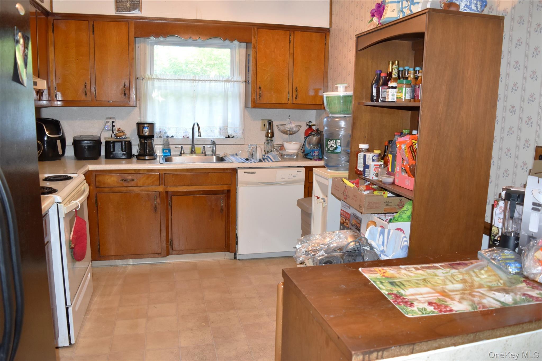 164 Brookside Farms Road Newburgh, NY 12550 - Photo 10 of 18 a kitchen with stainless steel appliances granite countertop a sink stove and a refrigerator