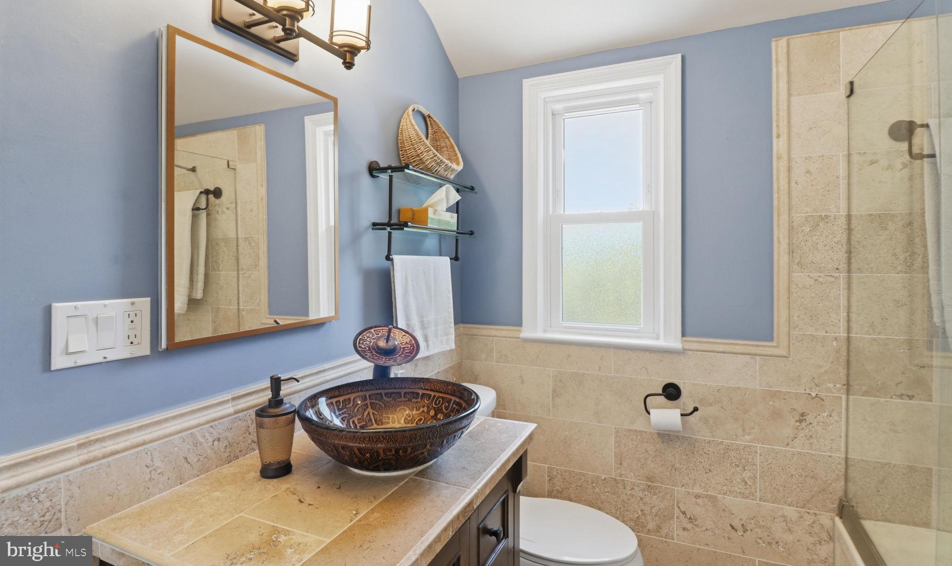 11708 Galt Avenue Silver Spring, MD 20902 - Photo 13 of 25 Charming bathroom with coastal vibes.