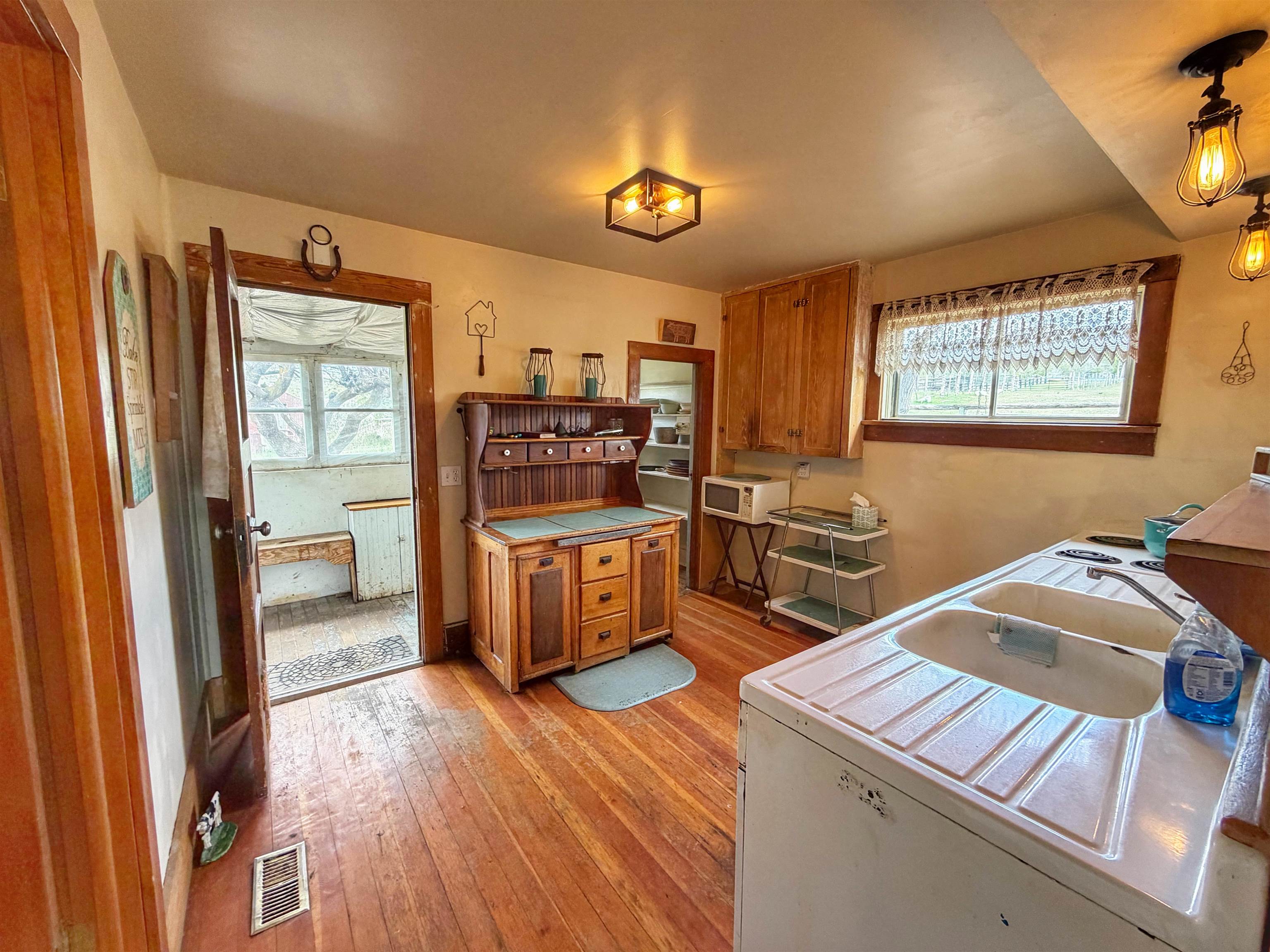 11260 54 7/10 Road Molina, CO 81646 - Photo 7 of 31 a kitchen that has a sink and a stove in it