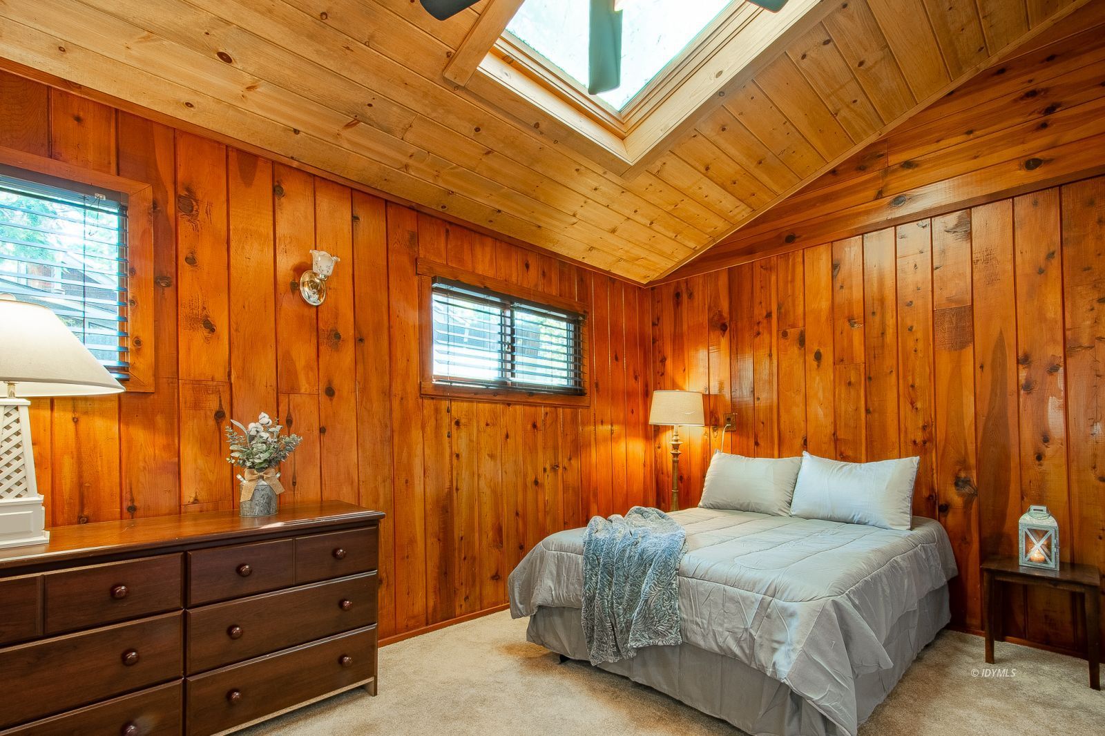 53545 Tollgate Road Idyllwild, CA 92549 - Photo 11 of 30 a bedroom with a bed and a dresser