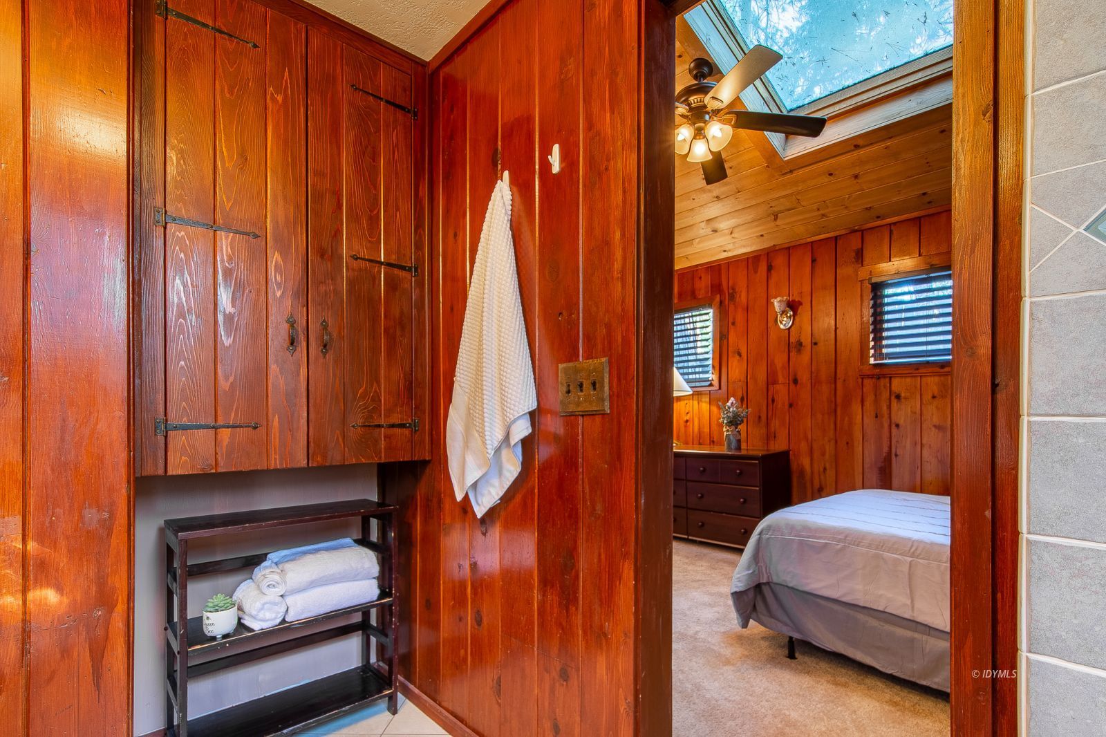 53545 Tollgate Road Idyllwild, CA 92549 - Photo 14 of 30 a bedroom with a bed and a window