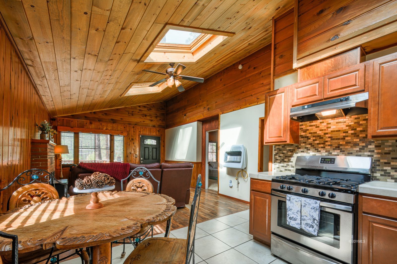 53545 Tollgate Road Idyllwild, CA 92549 - Photo 6 of 30 a view of a dining room with furniture window and outside view