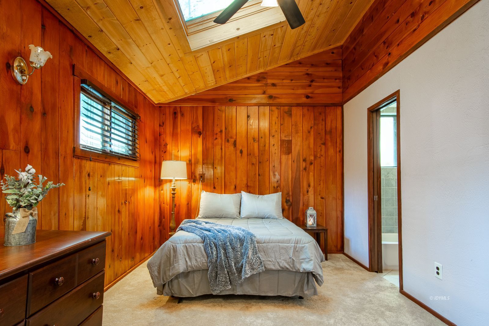 53545 Tollgate Road Idyllwild, CA 92549 - Photo 10 of 30 a bedroom with a bed and a dresser