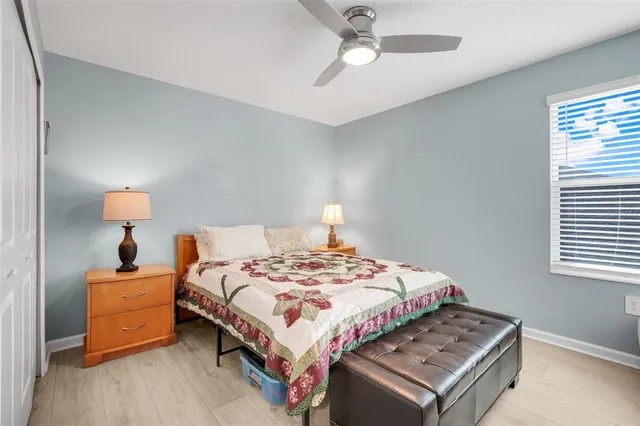 a work room with furniture and a window