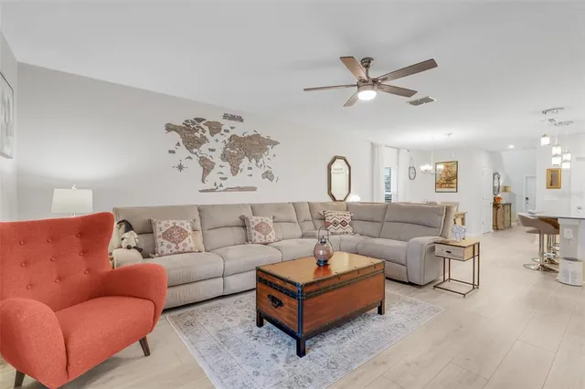 a bathroom with a double vanity sink a mirror and a bathtub