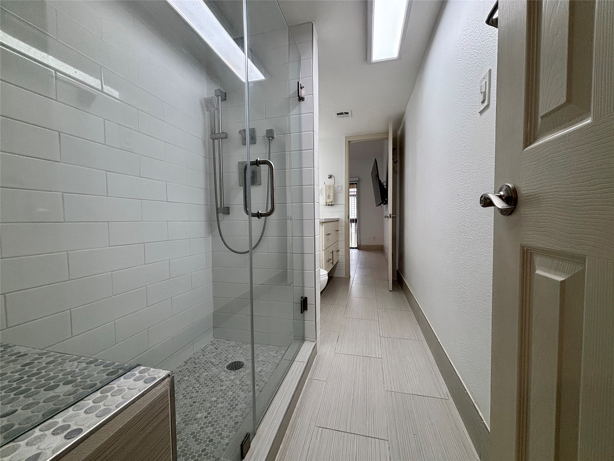 12900 Walden Road, Unit 508E Montgomery, TX 77356 - Photo 16 of 25 a bathroom with a granite countertop shower and a sink