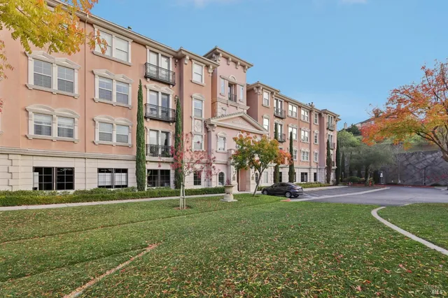 front view of a building with a yard