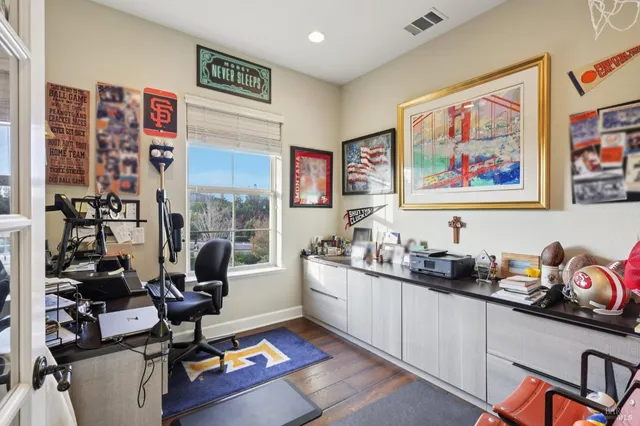 a view of a workspace with furniture and workspace