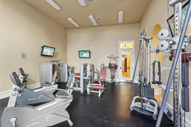 a view of a room with gym equipment