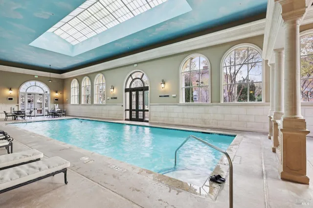 a view of a living room and dining room