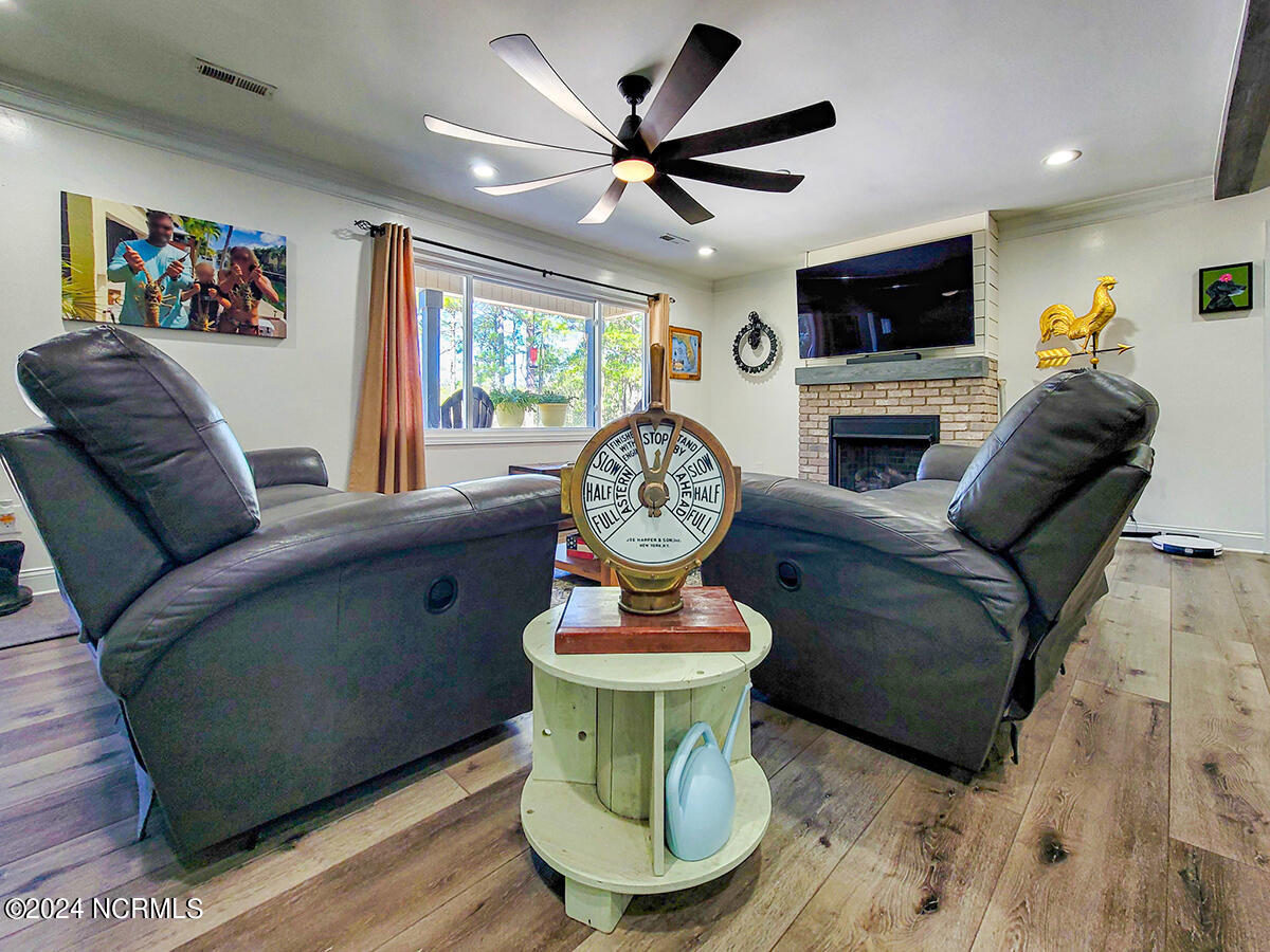 171 Stump Sound Church Road Holly Ridge, NC 28445 - Photo 16 of 111 Additional angle of living room