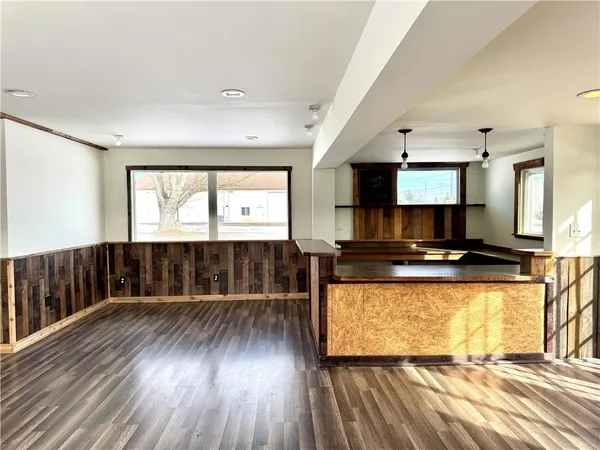 a view of kitchen with microwave and stove