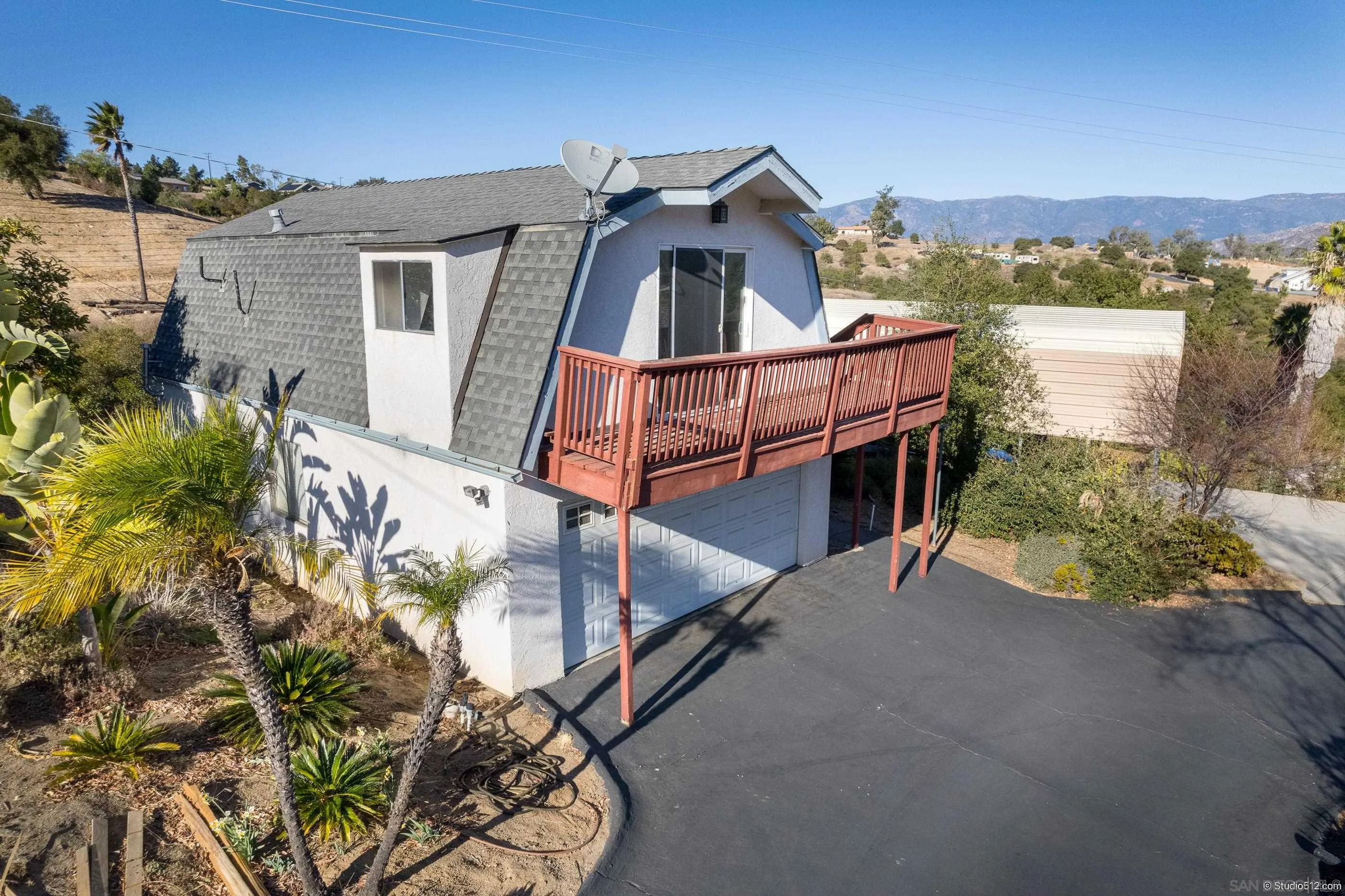 27303 Cool Water Ranch Road Valley Center, CA 92082 - Photo 24 of 30 a view of a house with a ocean view