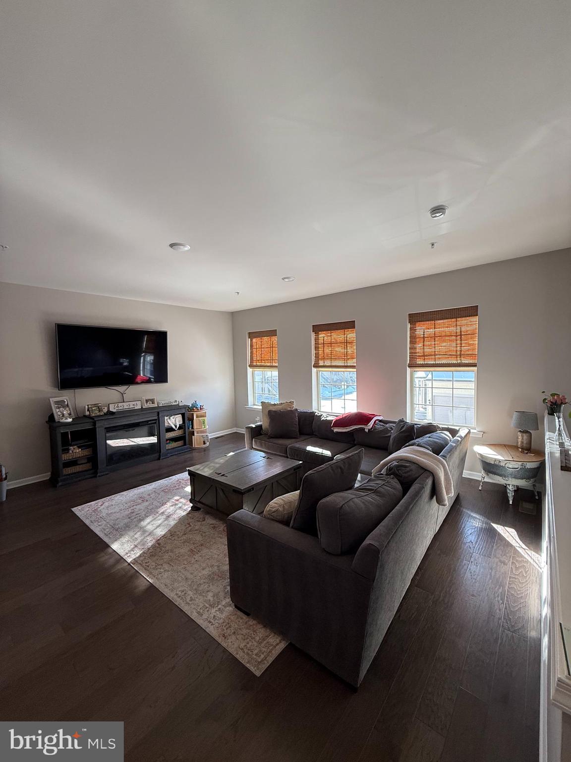 31 Par Lane Downingtown, PA 19335 - Photo 11 of 37 a living room with furniture and a flat screen tv