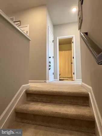 wooden floor and an entryway in a room