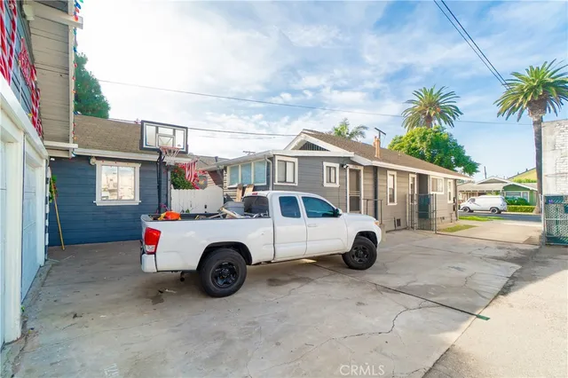 a view of outdoor space with deck and barbeque oven