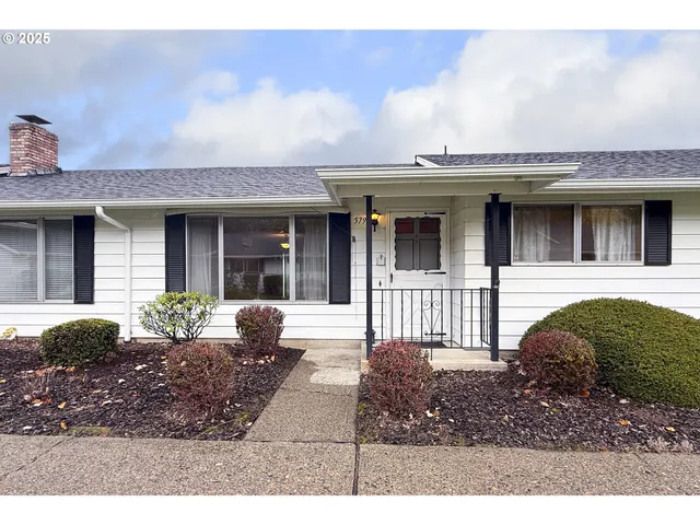 a house view with a garden space