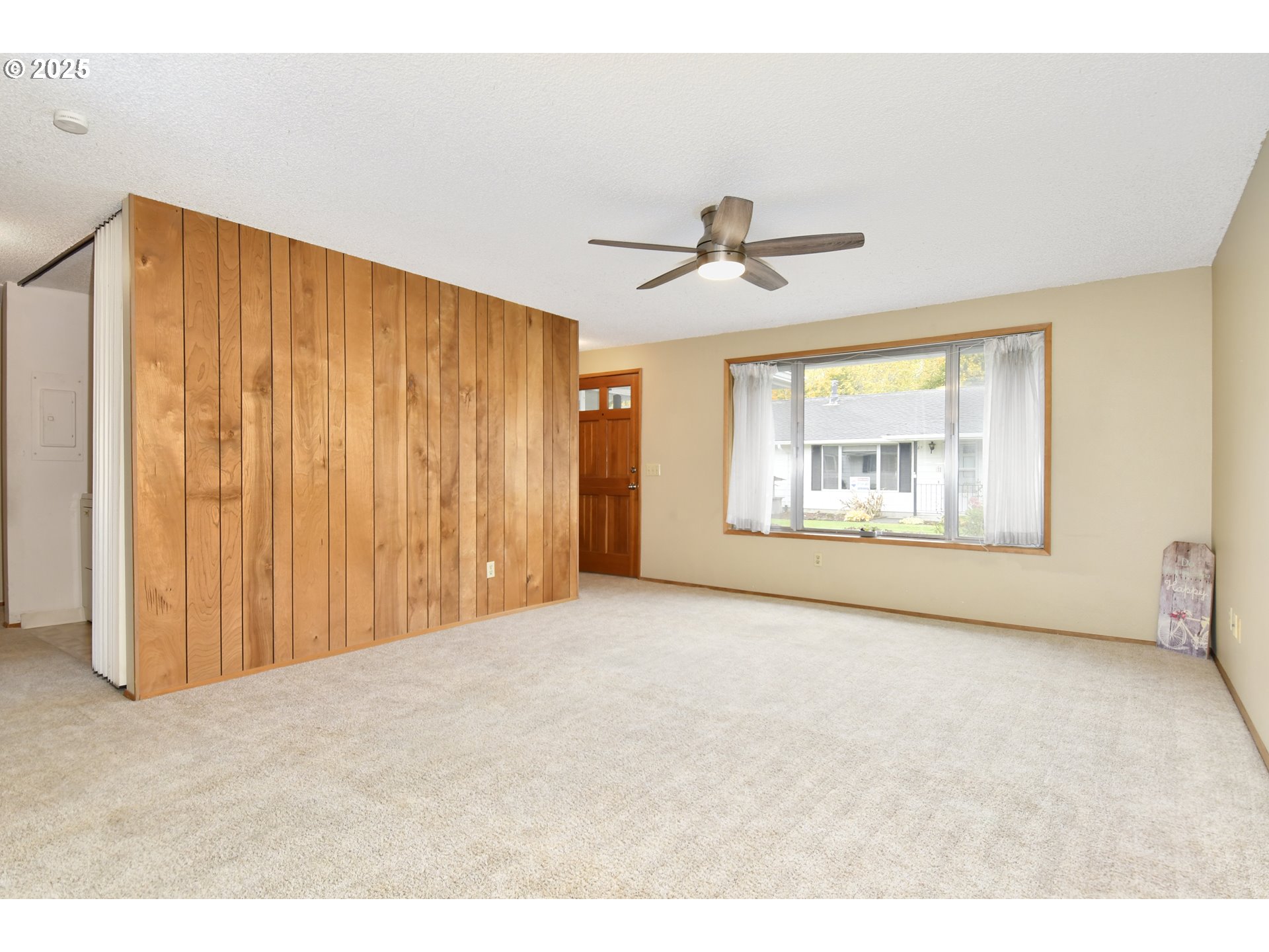579 Northeast Fleming Avenue, Unit C41 Gresham, OR 97030 - Photo 2 of 32 a view of an empty room with a window