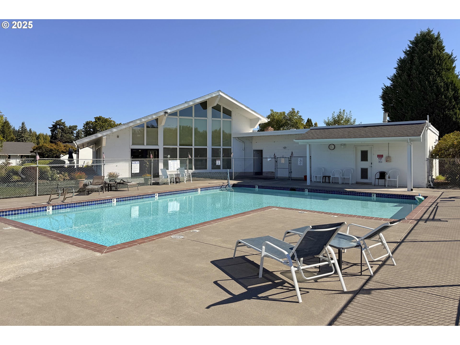 579 Northeast Fleming Avenue, Unit C41 Gresham, OR 97030 - Photo 31 of 32 a house view with a seating space and a garden view
