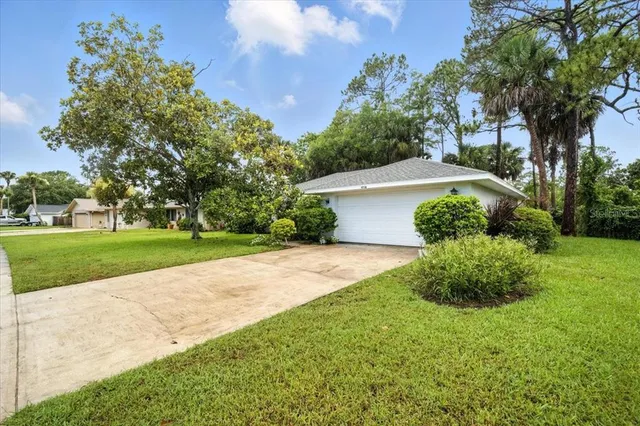 a view of a backyard with a garden